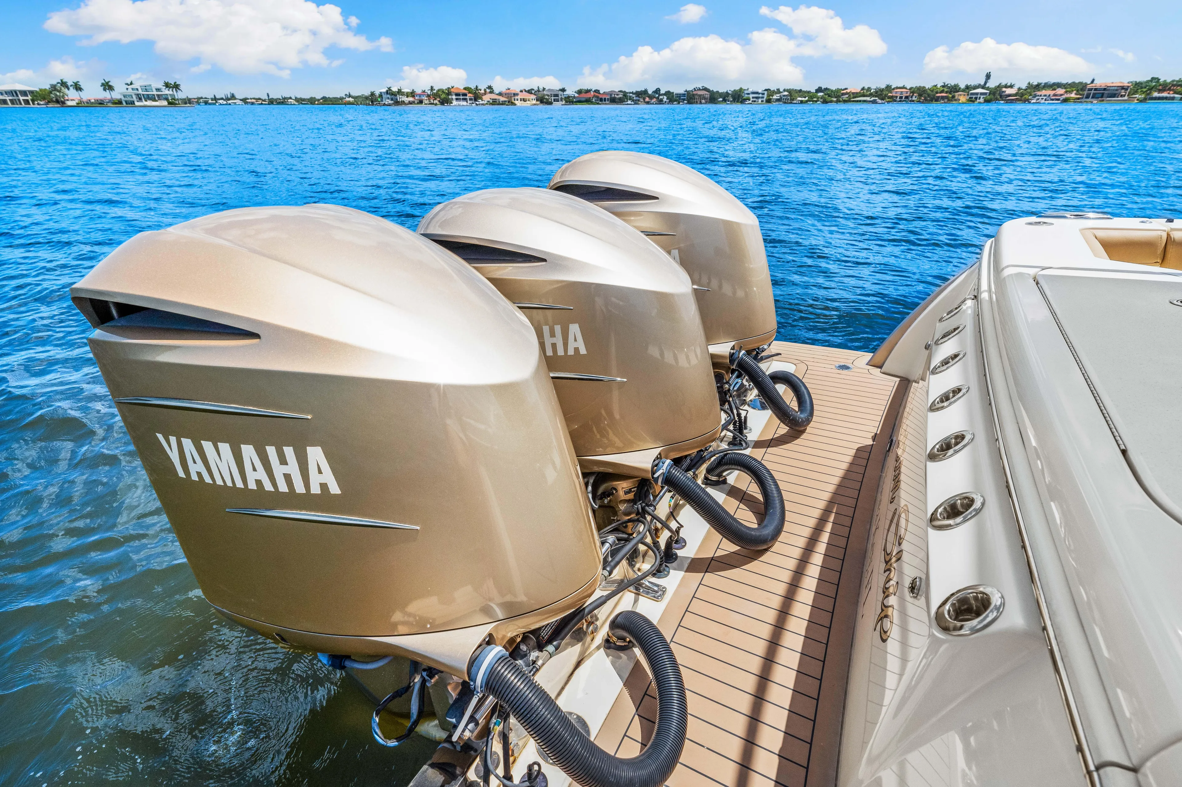  Yacht Photos Pics 2018 Scout 380 LXF with triple Yamaha outboard engines on the water.