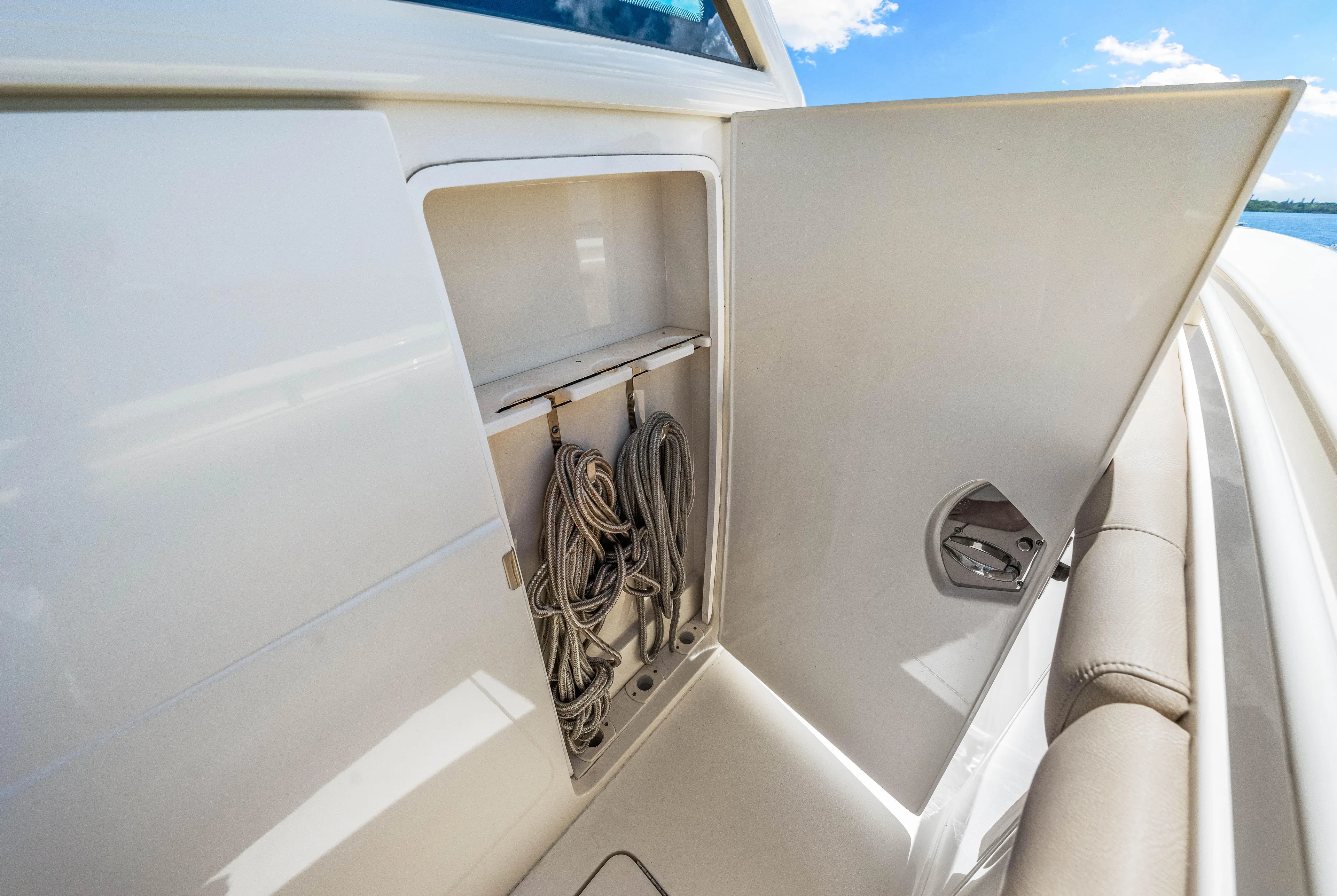  Yacht Photos Pics 2018 Scout 380 LXF boat storage compartment with ropes.
