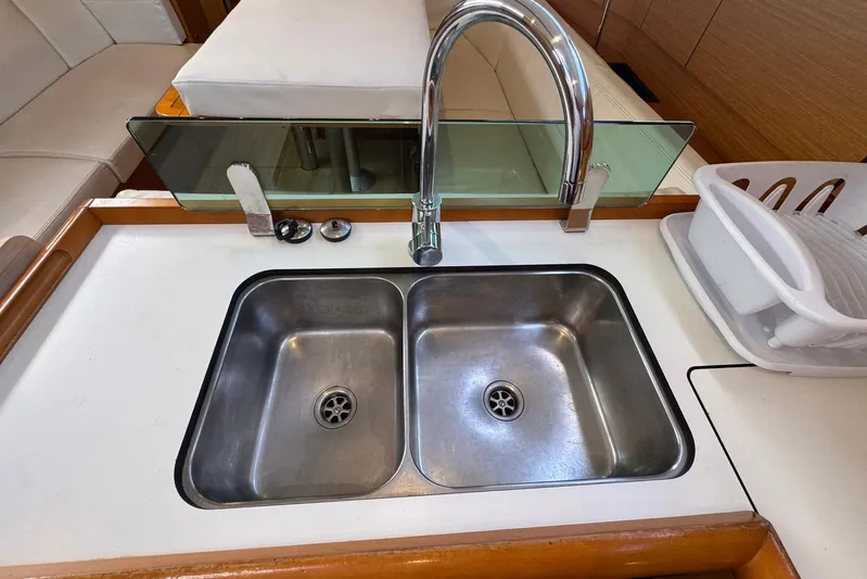 Sea Ranch II Yacht Photos Pics Stainless steel double sink in 2018 Jeanneau Sun Odyssey 389 yacht kitchen.