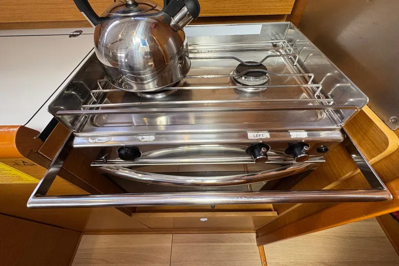 Sea Ranch II Yacht Photos Pics Stainless steel stove with kettle on Jeanneau Sun Odyssey 389, 2018 model.