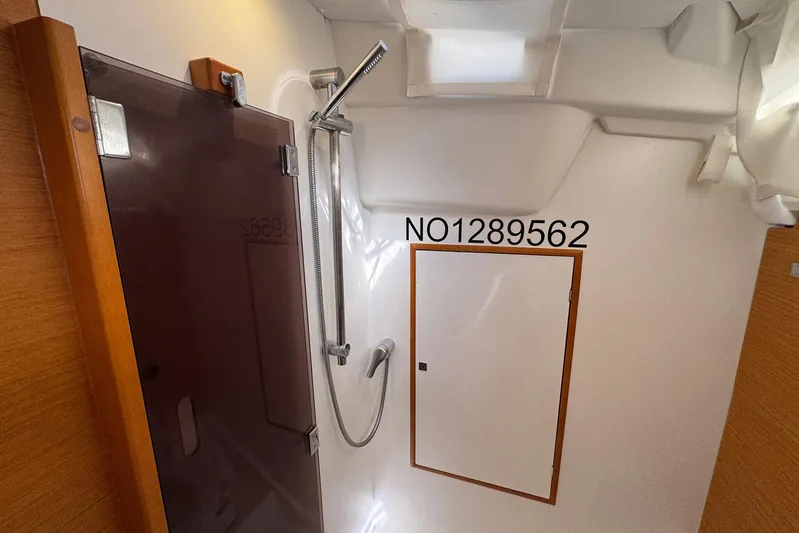 Sea Ranch II Yacht Photos Pics Interior of 2018 Jeanneau Sun Odyssey 389 yacht bathroom with shower and storage.