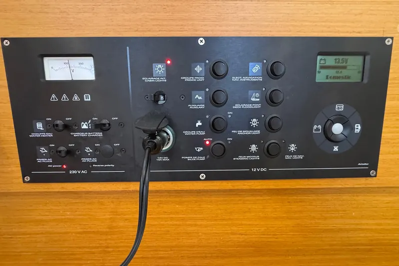 Sea Ranch II Yacht Photos Pics Control panel of a 2018 Jeanneau Sun Odyssey 389 sailboat, featuring various switches and gauges.