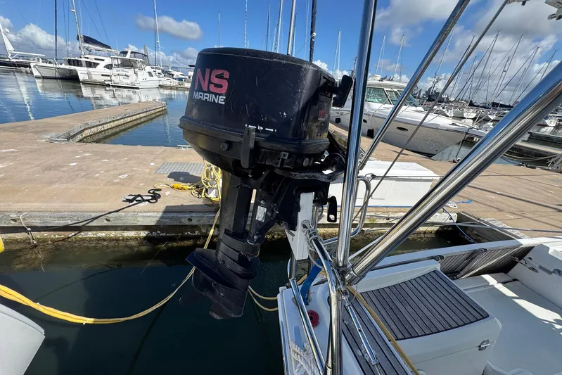 Sea Ranch II Yacht Photos Pics Outboard motor on Jeanneau Sun Odyssey 389, 2018 model, docked at marina.