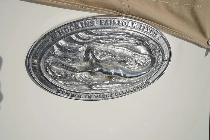 Faith Yacht Photos Pics Huckins 44 Atlantic 2003 emblem with "Symbol of Yacht Perfection" inscription.