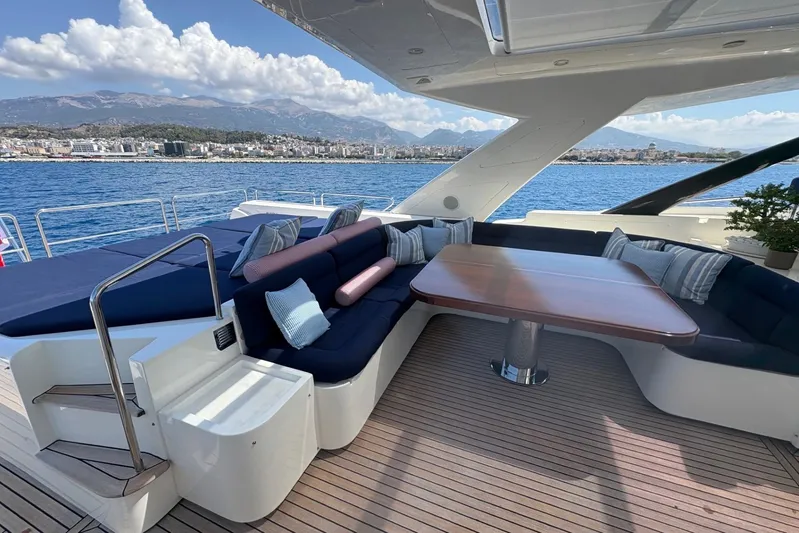 Inspiration B Yacht Photos Pics Luxurious 2006 Ferretti CUSTOM LINE yacht deck with elegant seating and scenic ocean view.