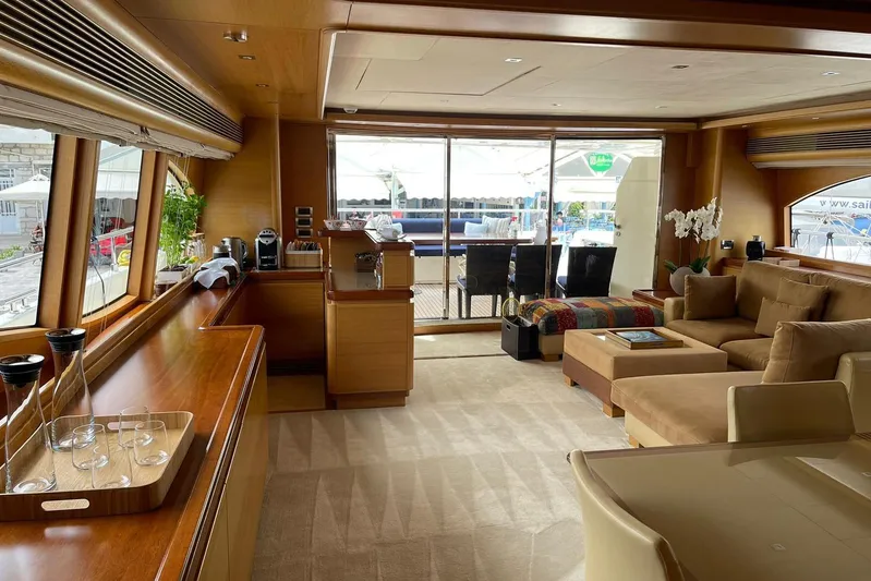 Inspiration B Yacht Photos Pics Luxurious 2006 Ferretti CUSTOM LINE yacht interior with elegant wood finishes and comfortable seating.