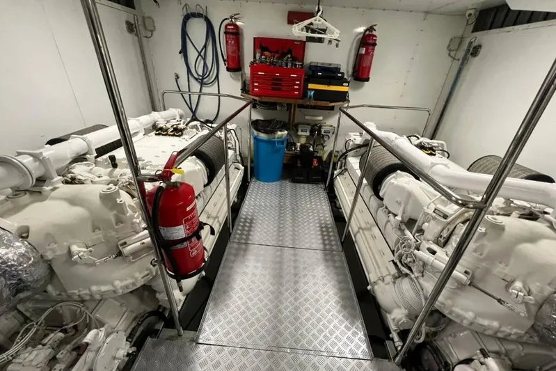 Inspiration B Yacht Photos Pics Engine room of 2006 Ferretti CUSTOM LINE yacht with fire extinguishers and maintenance tools.