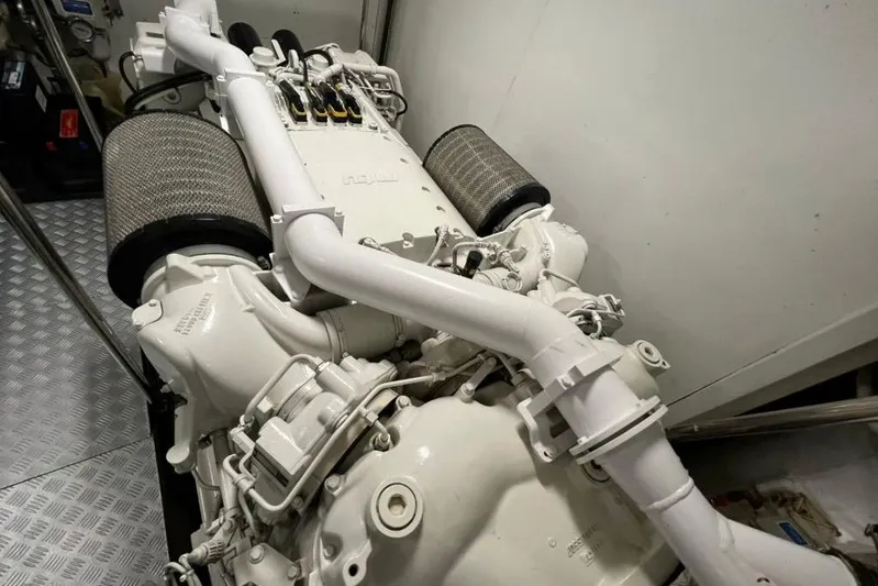 Inspiration B Yacht Photos Pics Engine of a 2006 Ferretti CUSTOM LINE yacht, showcasing intricate mechanical components.