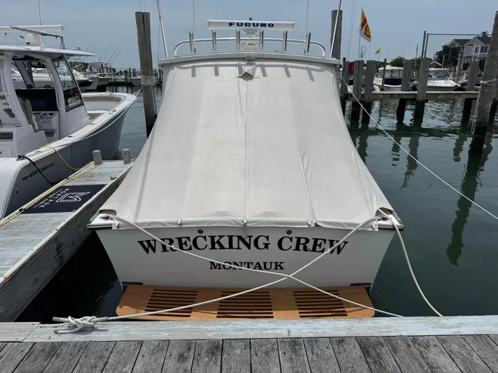 Wrecking Crew Yacht Photos Pics Fortier 26 boat named "Wrecking Crew" docked in Montauk marina, 2006 model.