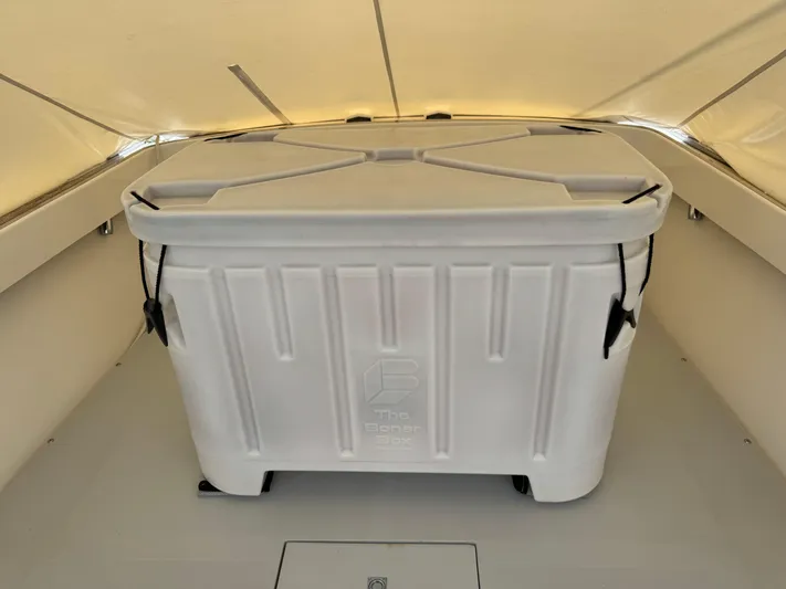 Wrecking Crew Yacht Photos Pics White cooler box inside a 2006 Fortier 26 boat cabin.