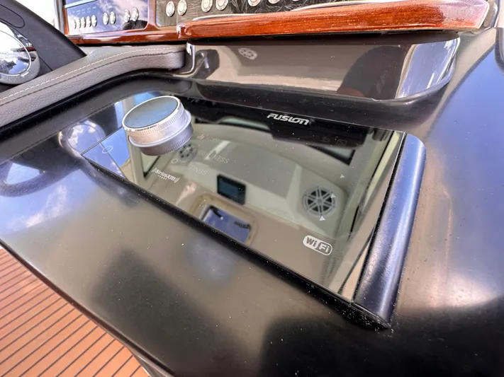  Yacht Photos Pics 2021 Tiara Sport 34 LS boat dashboard with Fusion audio system.