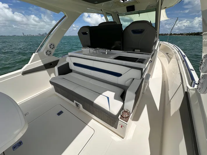  Yacht Photos Pics 2021 Tiara Sport 34 LS boat interior with seating and ocean view.