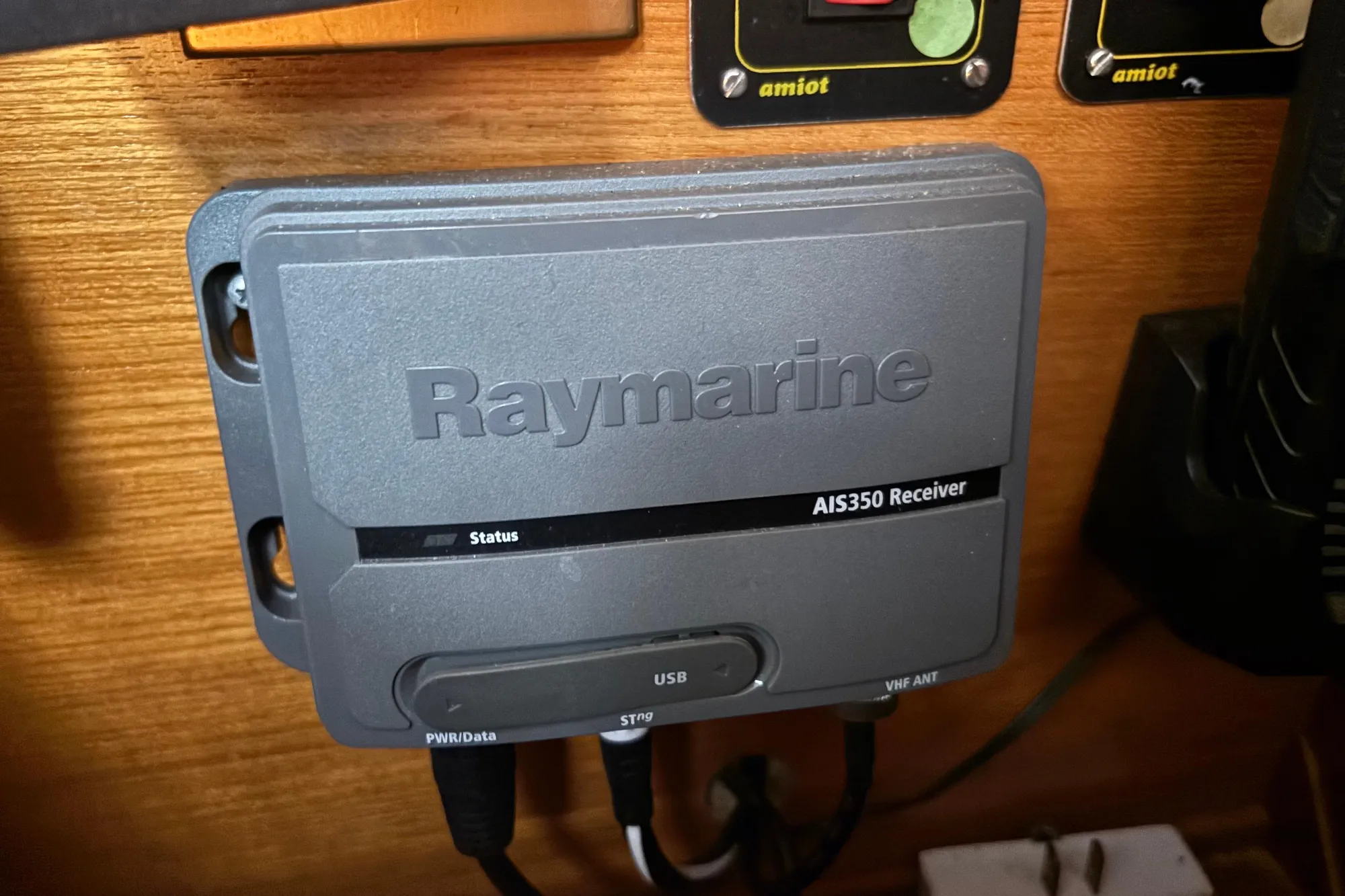 Raymarine AIS350 receiver installed on 1986 Beneteau First 375 yacht interior.