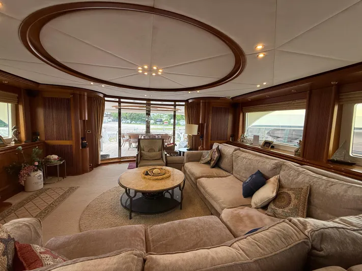 Sunrise Yacht Photos Pics Luxurious interior of 2007 Ses Yachts SES 34 with plush seating and elegant decor.