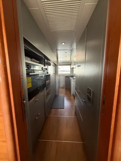 Sunrise Yacht Photos Pics Interior of 2007 Ses Yachts SES 34, featuring modern kitchen and sleek cabinetry.