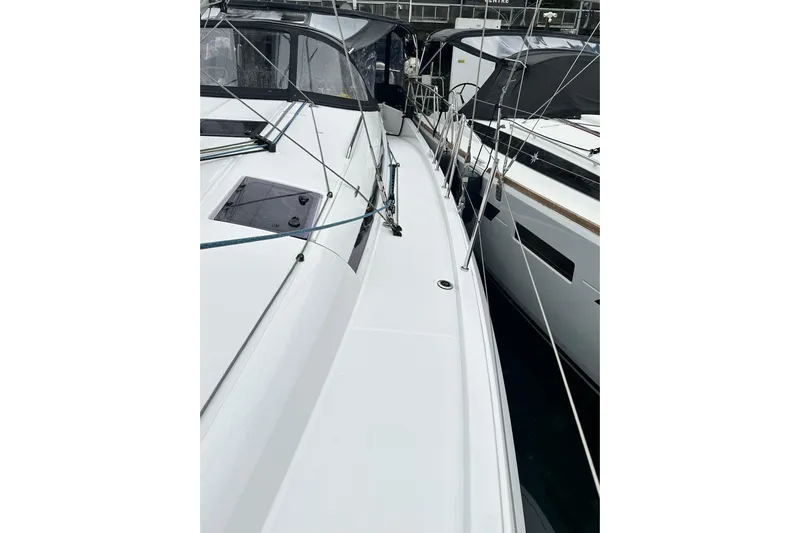 Lost Traveler Yacht Photos Pics 2020 Jeanneau Sun Odyssey 440 sailboat deck view, showcasing sleek design and rigging.