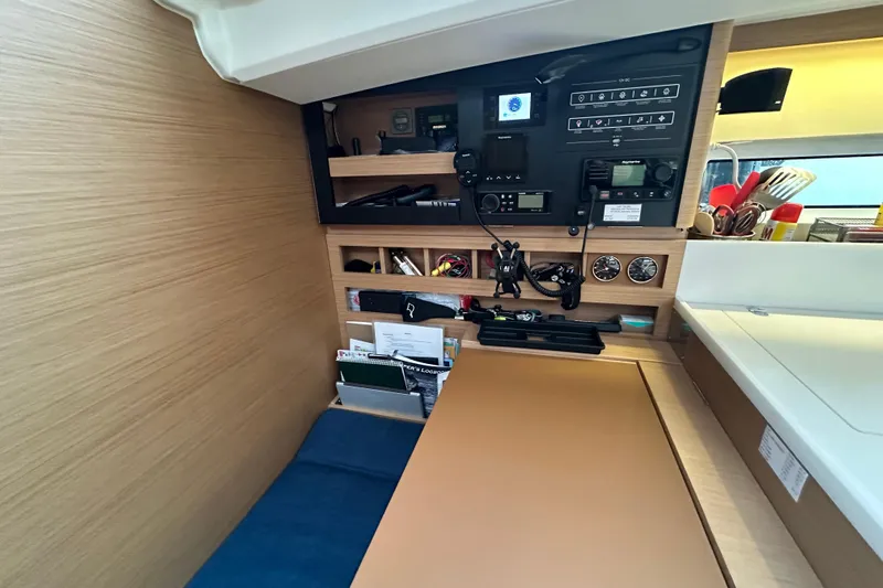 Lost Traveler Yacht Photos Pics Interior of 2020 Jeanneau Sun Odyssey 440 yacht with navigation equipment and storage.