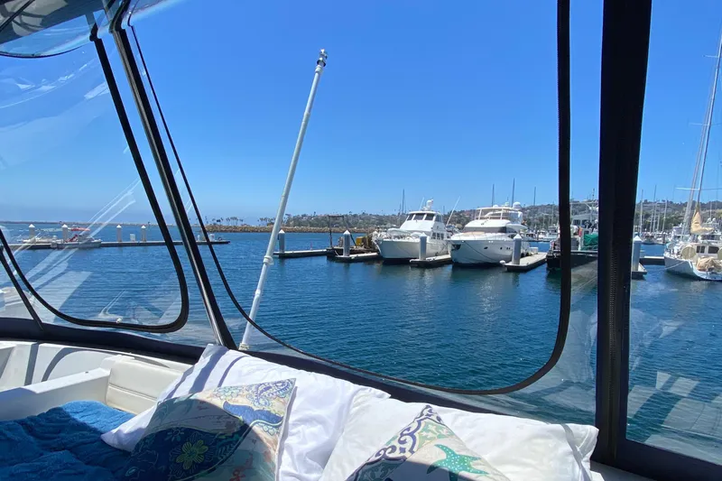 Dianne Yacht Photos Pics View from a 2003 Bluewater Yachts 6000, overlooking a marina with boats and clear blue skies.