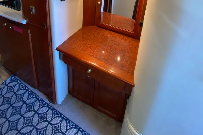 Dianne Yacht Photos Pics Luxurious wood vanity in 2003 Bluewater Yachts 6000 custom series interior.