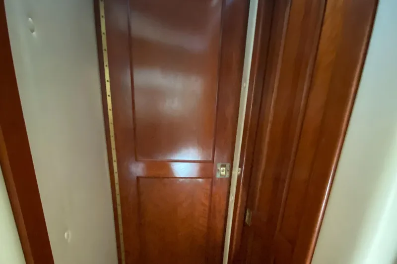 Dianne Yacht Photos Pics Wooden interior door on 2003 Bluewater Yachts 6000 custom series.