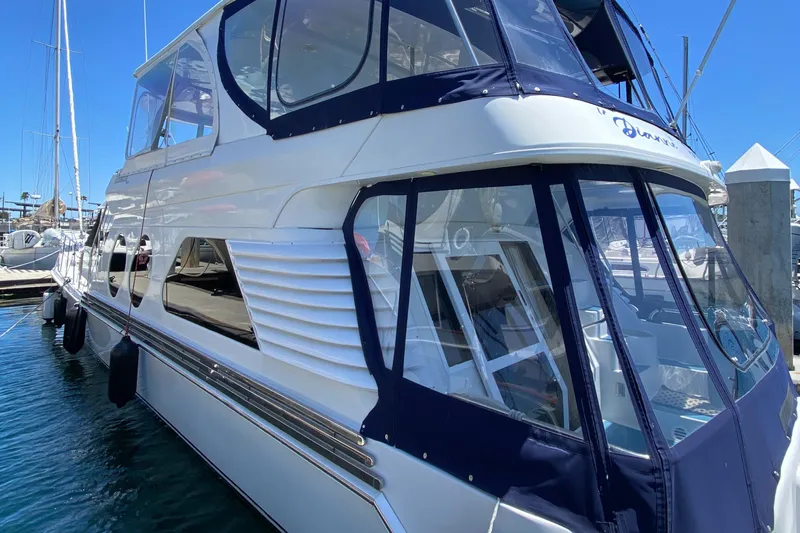 Dianne Yacht Photos Pics 2003 Bluewater Yachts 6000 Custom Series docked, featuring sleek design and spacious cabin.