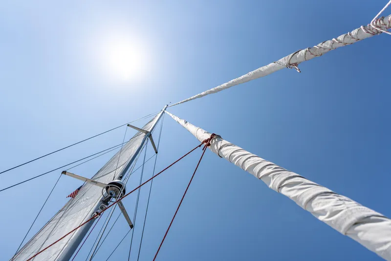 Atlas Yacht Photos Pics Sailboat mast and rigging under clear blue sky, St Francis SF50, 2006.