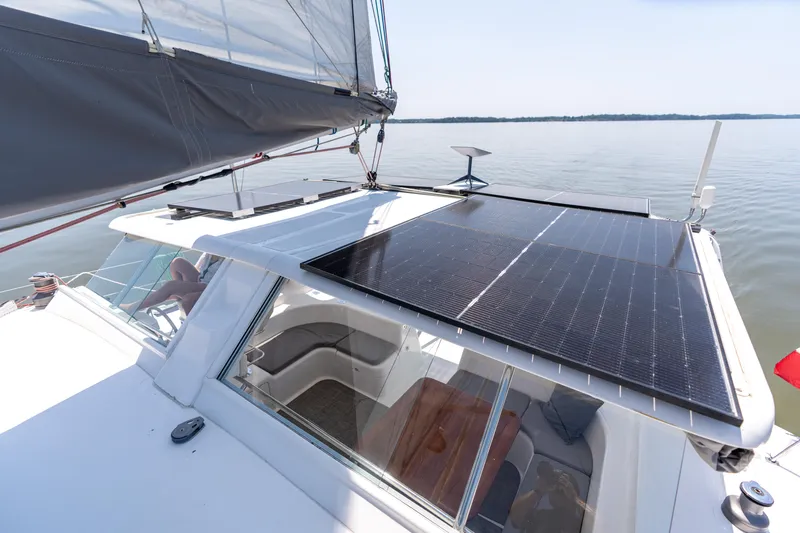 Atlas Yacht Photos Pics Sailing catamaran St Francis SF50 with solar panels on deck, calm waters, 2006 model.