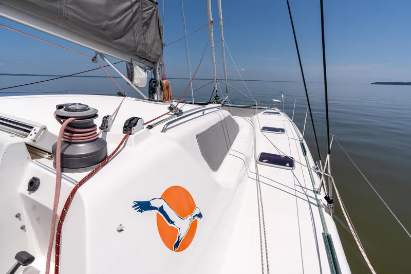Atlas Yacht Photos Pics Sailing yacht St Francis SF50, 2006 model, on calm waters under clear blue skies.