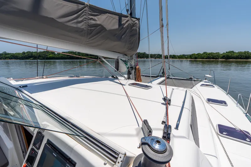 Atlas Yacht Photos Pics Sailing catamaran St Francis SF50, 2006 model, on calm waters with clear sky.