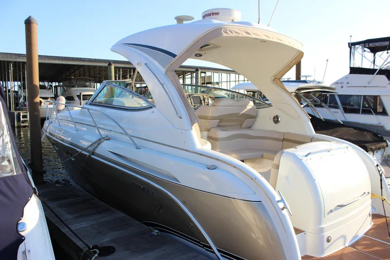  Yacht Photos Pics 2008 Formula 34 Performance Cruiser docked at marina, showcasing sleek design and spacious seating.