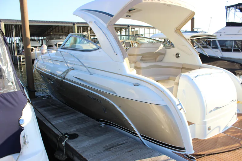  Yacht Photos Pics 2008 Formula 34 Performance Cruiser docked at marina, showcasing sleek design and spacious interior.