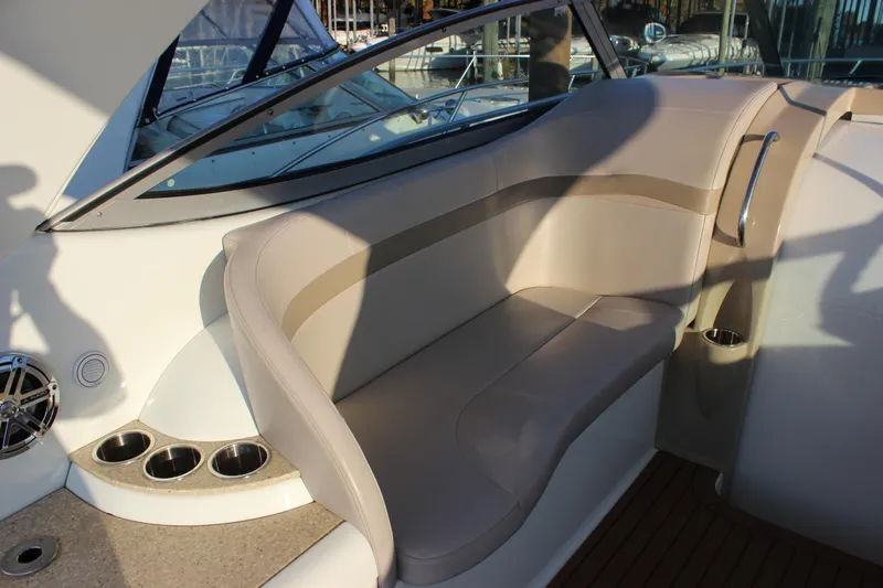  Yacht Photos Pics 2008 Formula 34 Performance Cruiser interior seating with cup holders and sleek design.