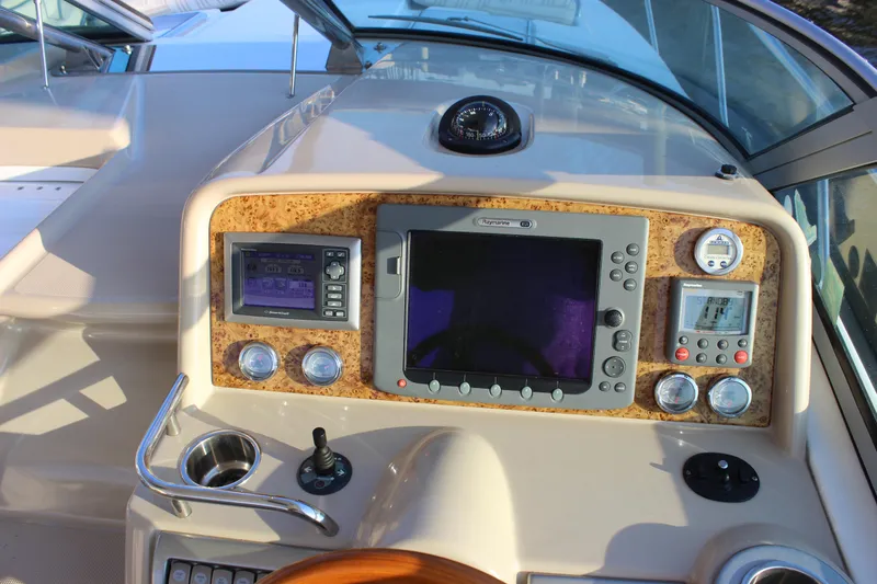  Yacht Photos Pics Control panel of a 2008 Formula 34 Performance Cruiser with navigation and monitoring systems.