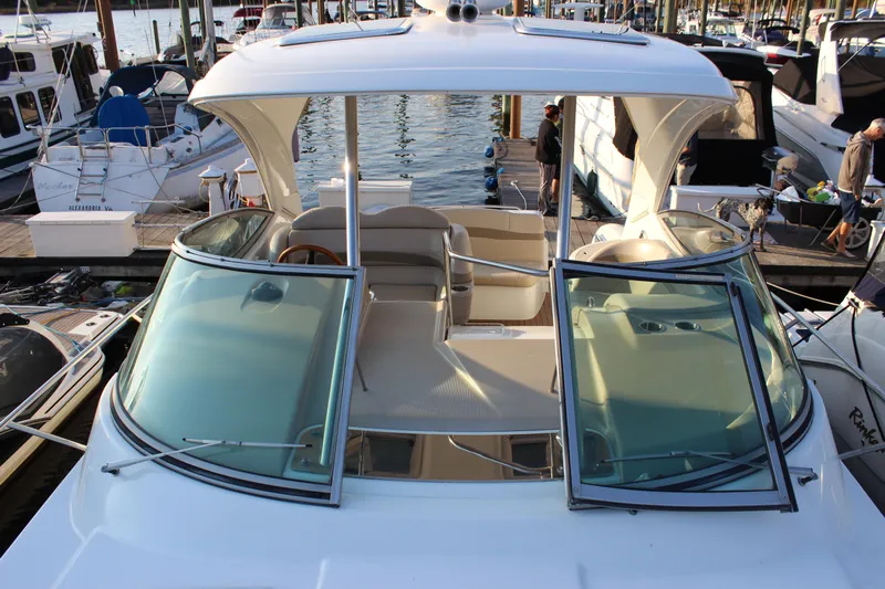  Yacht Photos Pics 2008 Formula 34 Performance Cruiser docked at marina, showcasing open cockpit and sleek design.