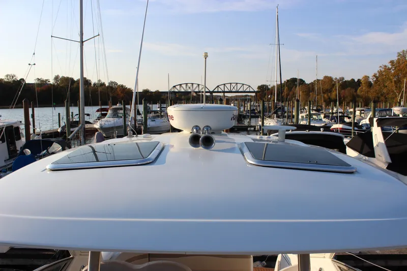 Yacht Photos Pics 2008 Formula 34 Performance Cruiser docked at marina, surrounded by sailboats.