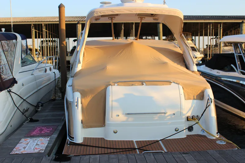  Yacht Photos Pics 2008 Formula 34 Performance Cruiser docked with protective cover, rear view.