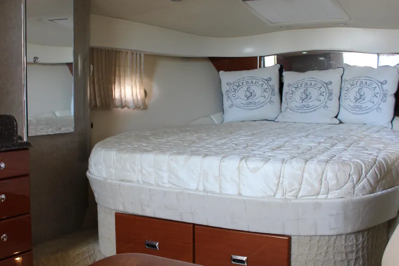  Yacht Photos Pics Luxurious cabin interior of 2008 Formula 34 Performance Cruiser with plush bedding and elegant decor.