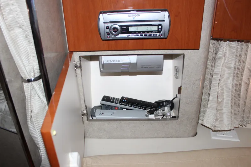  Yacht Photos Pics 2008 Formula 34 Performance Cruiser interior with Kenwood stereo and remote controls.