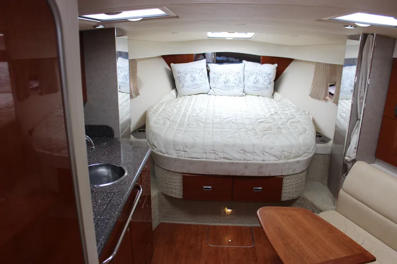  Yacht Photos Pics 2008 Formula 34 Performance Cruiser interior with bed, kitchenette, and seating area.