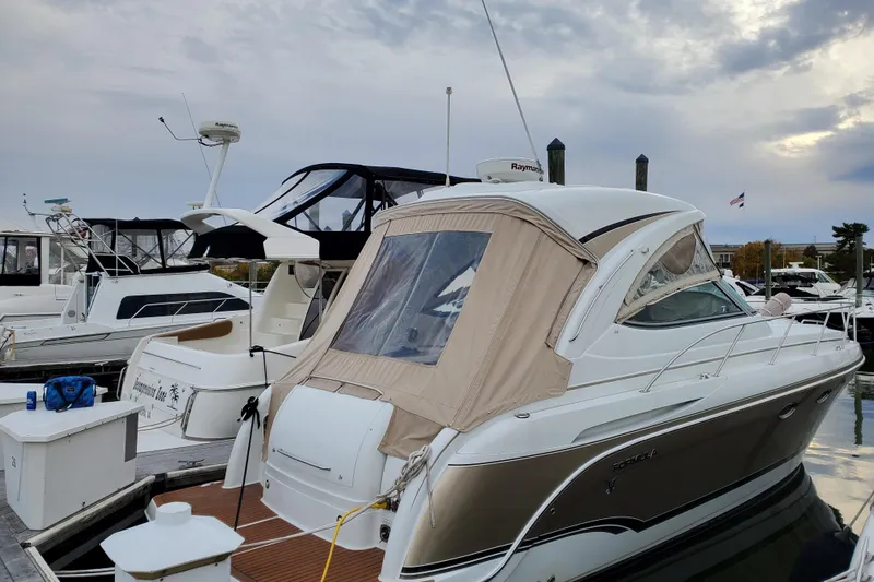  Yacht Photos Pics 2008 Formula 34 Performance Cruiser docked at marina under cloudy sky.