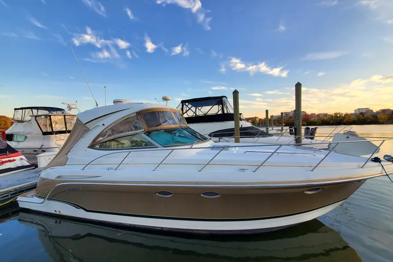  Yacht Photos Pics 2008 Formula 34 Performance Cruiser docked at marina under blue sky.