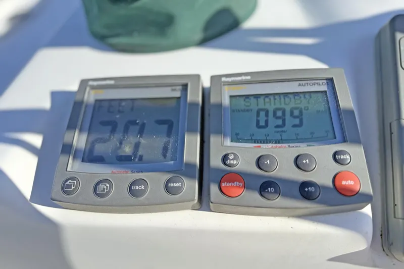 Bellabeaupied Yacht Photos Pics Raymarine autopilot displays on a 2004 Beneteau 473 yacht, showing depth and heading.