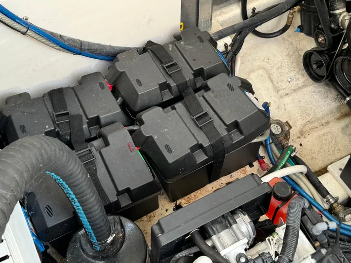  Yacht Photos Pics Engine compartment of 2014 Sea Ray 330 Sundancer with multiple battery boxes and wiring.
