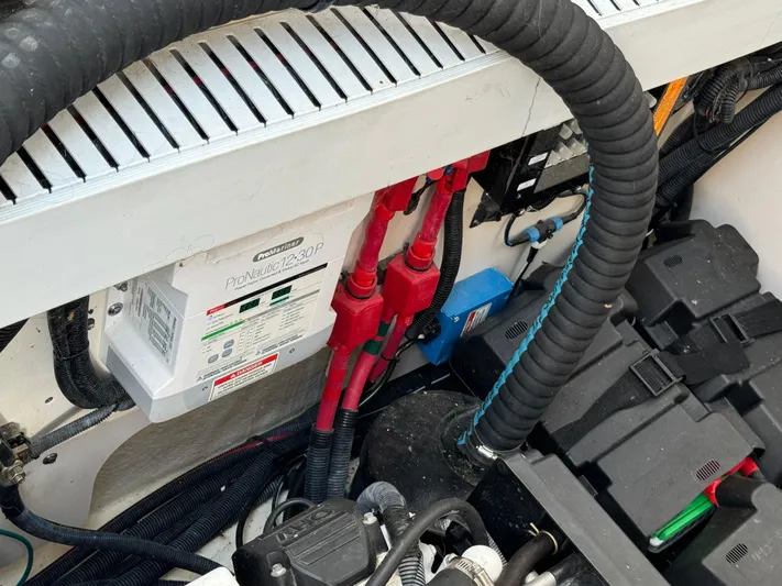  Yacht Photos Pics Engine compartment of 2014 Sea Ray 330 Sundancer with wiring and battery components.