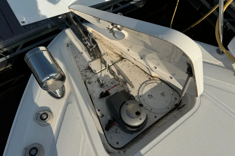  Yacht Photos Pics 2014 Sea Ray 330 Sundancer anchor compartment with open hatch and visible winch.
