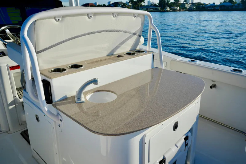 No Name 2024 30 Sea Hunt Yacht Photos Pics 2024 Sea Hunt 305 Ultra boat interior with countertop and sink by the water.