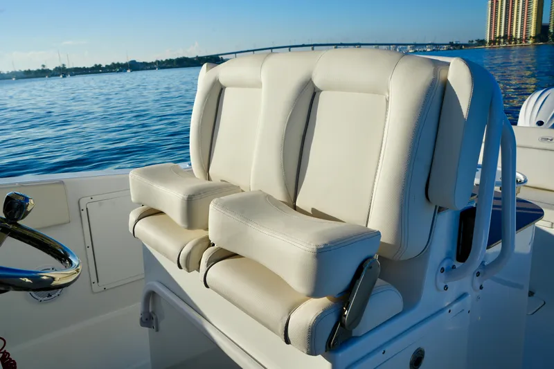 No Name 2024 30 Sea Hunt Yacht Photos Pics 2024 Sea Hunt 305 Ultra boat seats with ocean view in background.