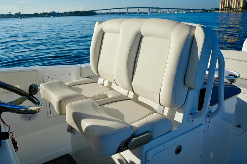 No Name 2024 30 Sea Hunt Yacht Photos Pics 2024 Sea Hunt 305 Ultra boat seats with ocean view and distant bridge.