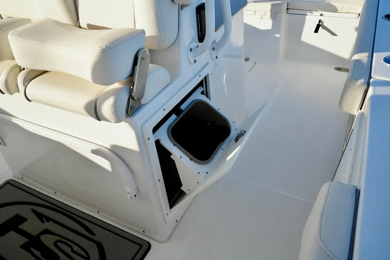 No Name 2024 30 Sea Hunt Yacht Photos Pics 2024 Sea Hunt 305 Ultra boat interior with open storage compartment and cushioned seating.