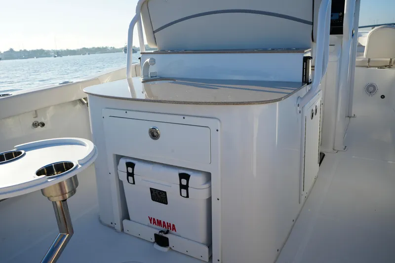 No Name 2024 30 Sea Hunt Yacht Photos Pics 2024 Sea Hunt 305 Ultra boat interior with Yamaha cooler and storage area.